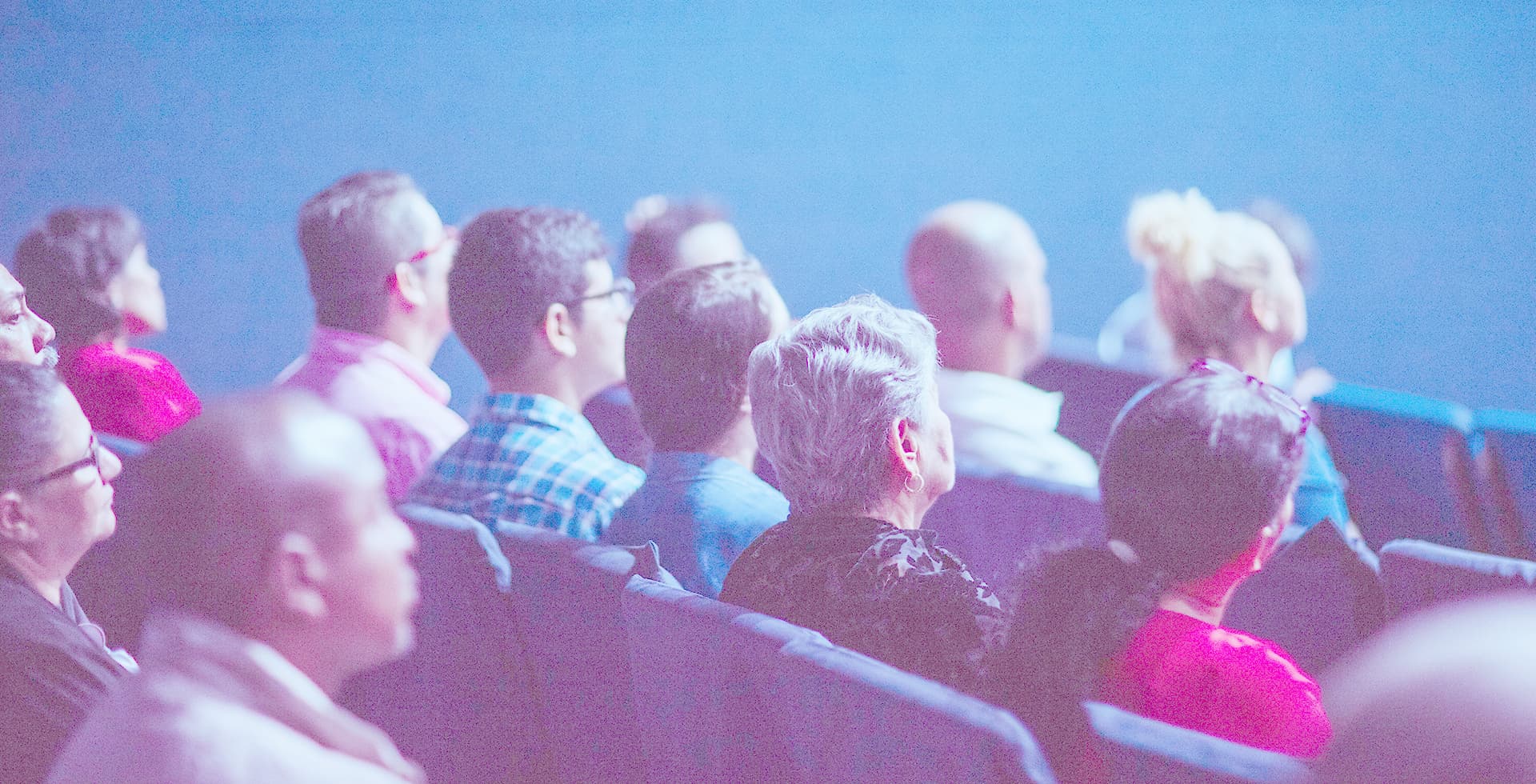 Many different types of people watching the film